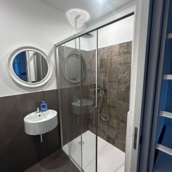 Ristrutturazione residenziale in centro storico a Bormio con diversa divisione dei locali e degli spazi interni