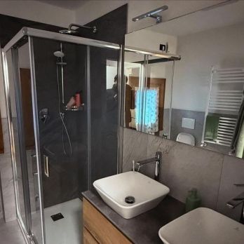 Ristrutturazione appartamento con stile montano moderno