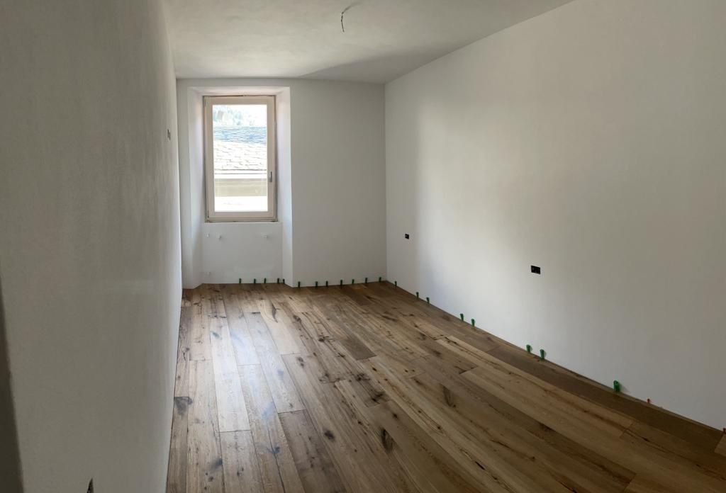 Ristrutturazione residenziale in centro storico a Bormio con diversa divisione dei locali e degli spazi interni