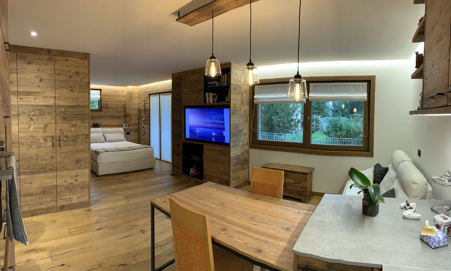 Riqualificazione e trasformazione in appartamento ad elevata efficienza energetica di locale adibito a portineria all'interno di condominio