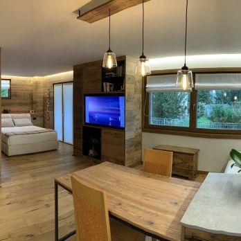 Riqualificazione e trasformazione in appartamento ad elevata efficienza energetica di locale adibito a portineria all'interno di condominio